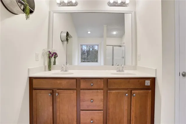 a spacious bathroom with a bathtub and a shower
