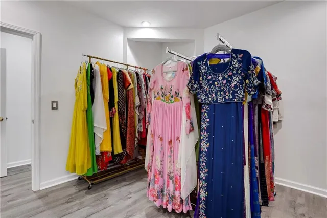 a kitchen with a sink and a mirror