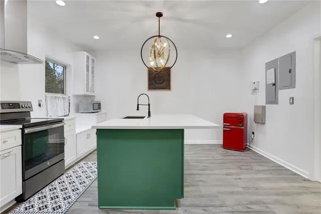 a projector room with furniture projector and screen