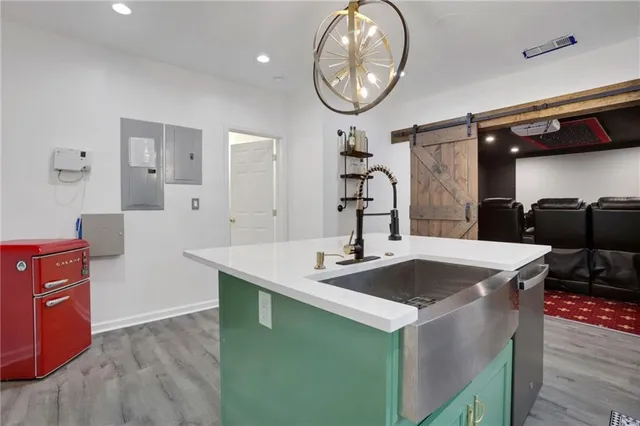 a bathroom with a toilet sink and shower