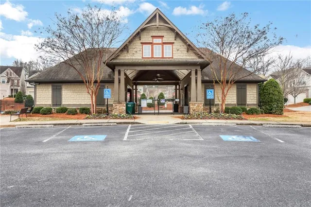 a backyard of a house with a tree
