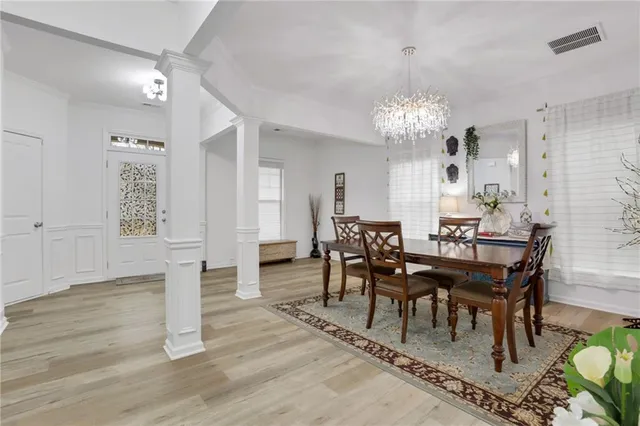 a view of a dining room with furniture