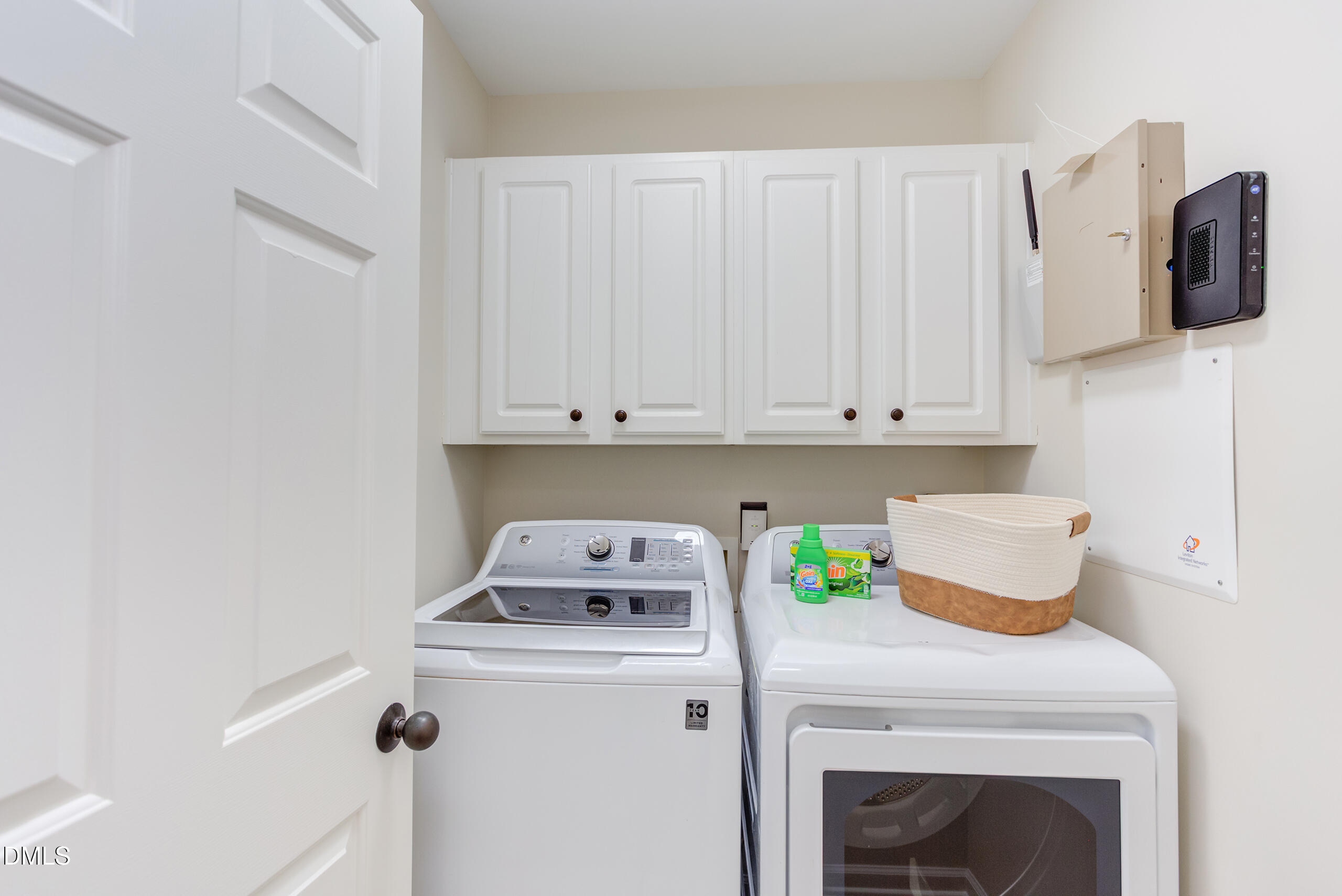 5620 Berry Creek Circle Raleigh, NC 27613 - Photo 30 of 38 Laundry area on 2nd level. Washer and dryer convey.