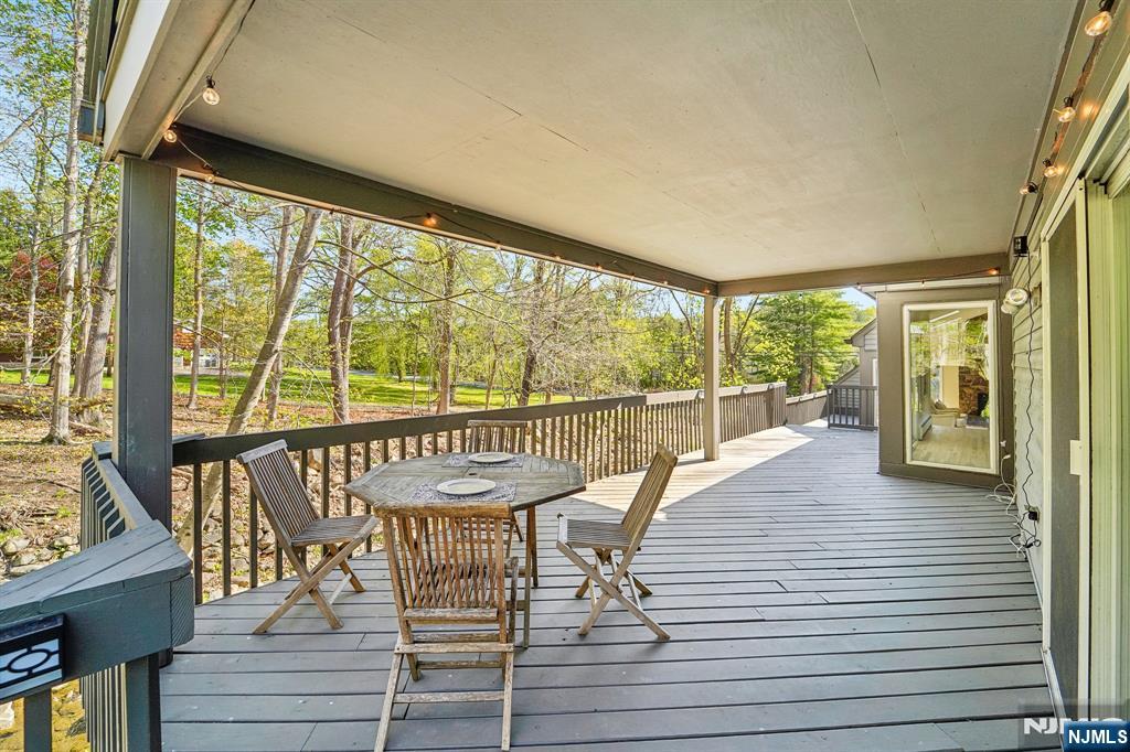11 Carlough Road Upper Saddle River, NJ 07458 - Photo 38 of 41 a view of a balcony with wooden floor