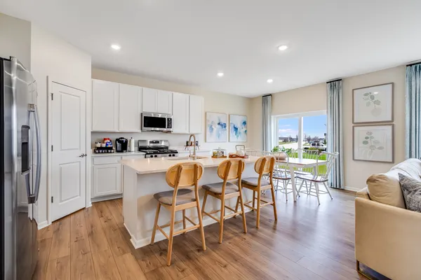 a view of kitchen with cabinets and stainless steel appliances