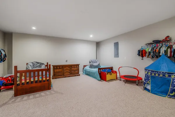 a bedroom with furniture and a couch