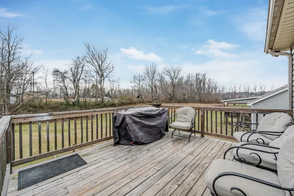 a view of balcony with furniture