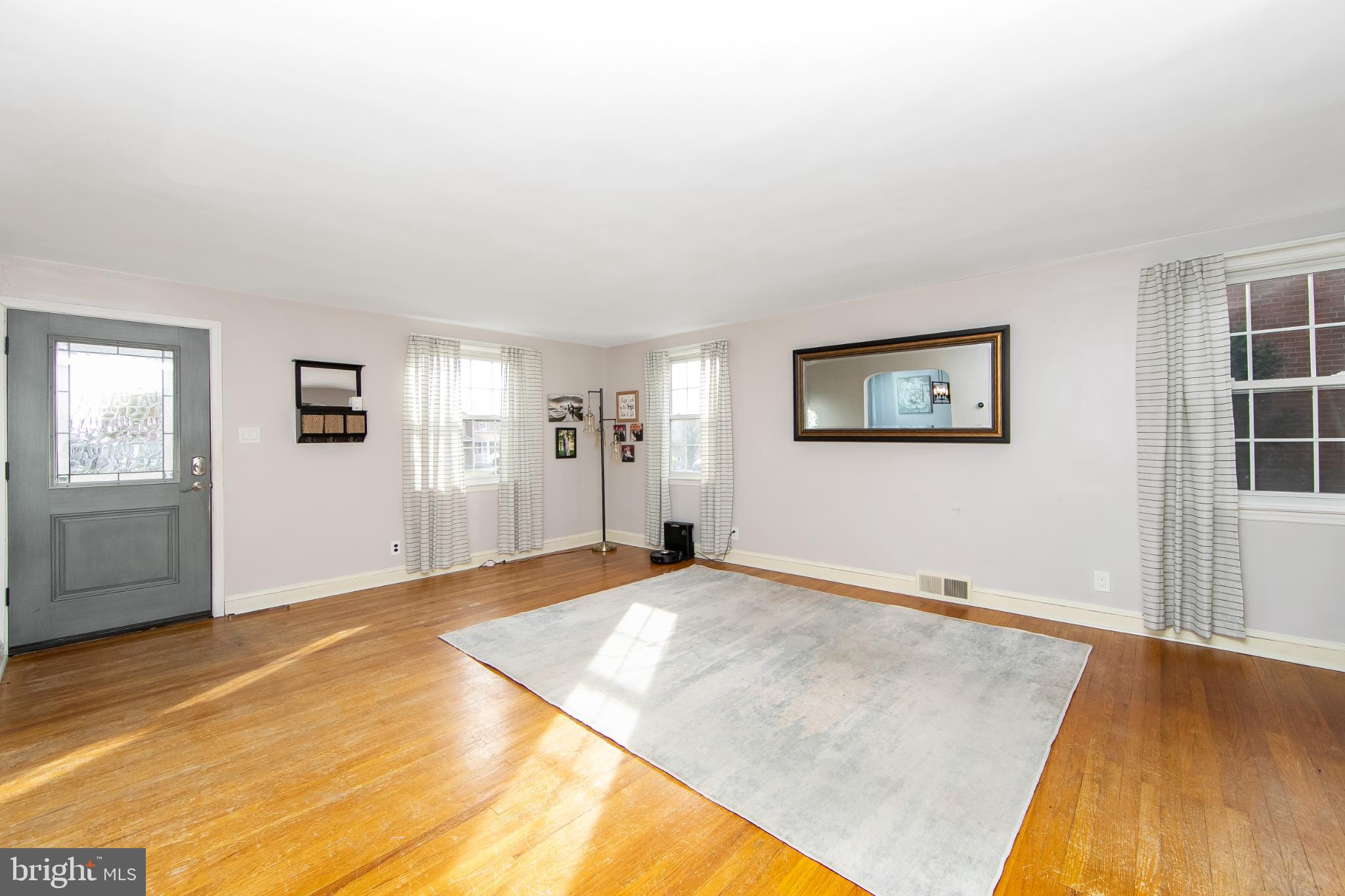 414 Stanfield Road Springfield, PA 19064 - Photo 13 of 51 a view of a big room with windows and cabinet