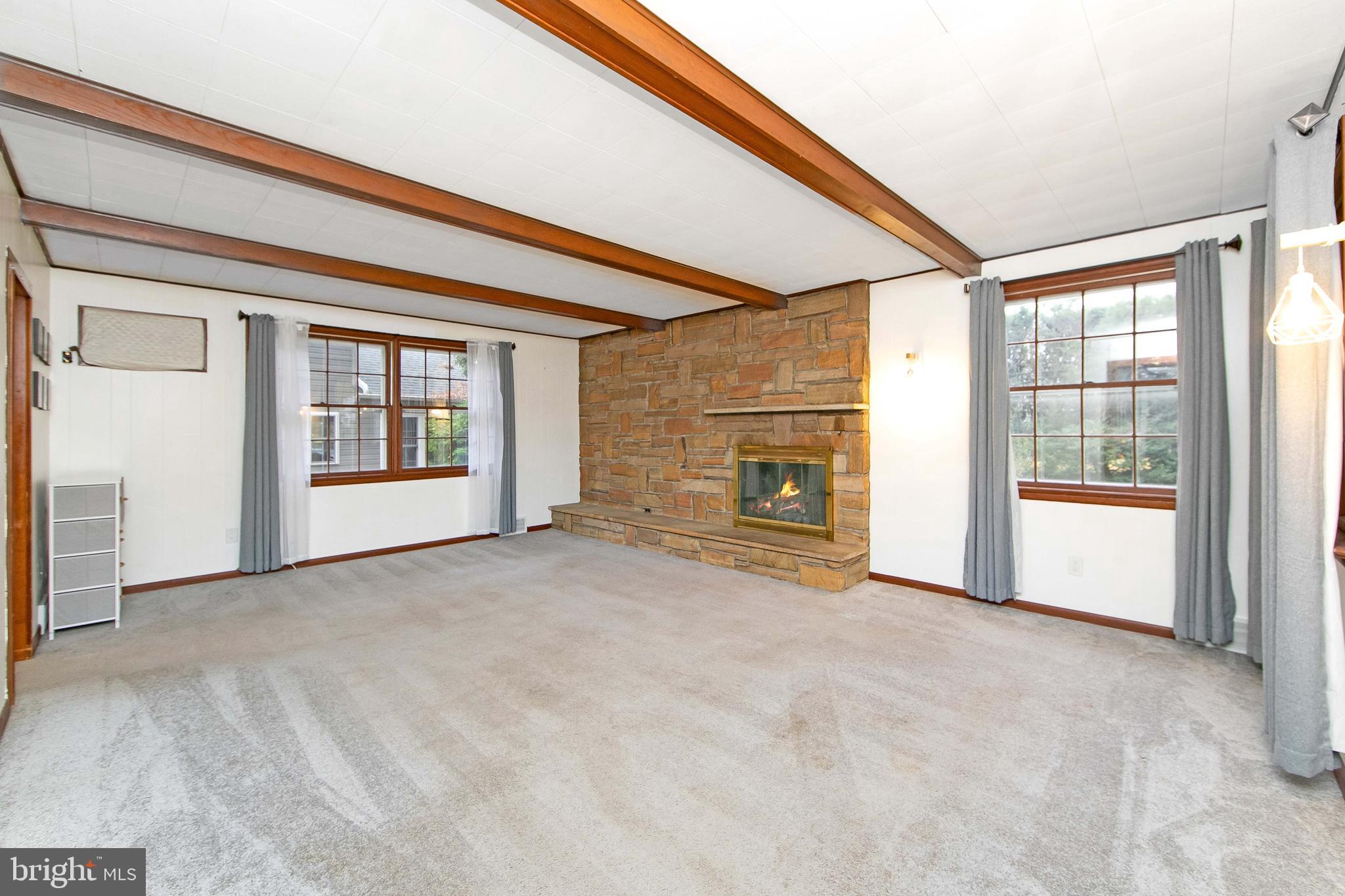 414 Stanfield Road Springfield, PA 19064 - Photo 21 of 51 a view of empty room with a fireplace