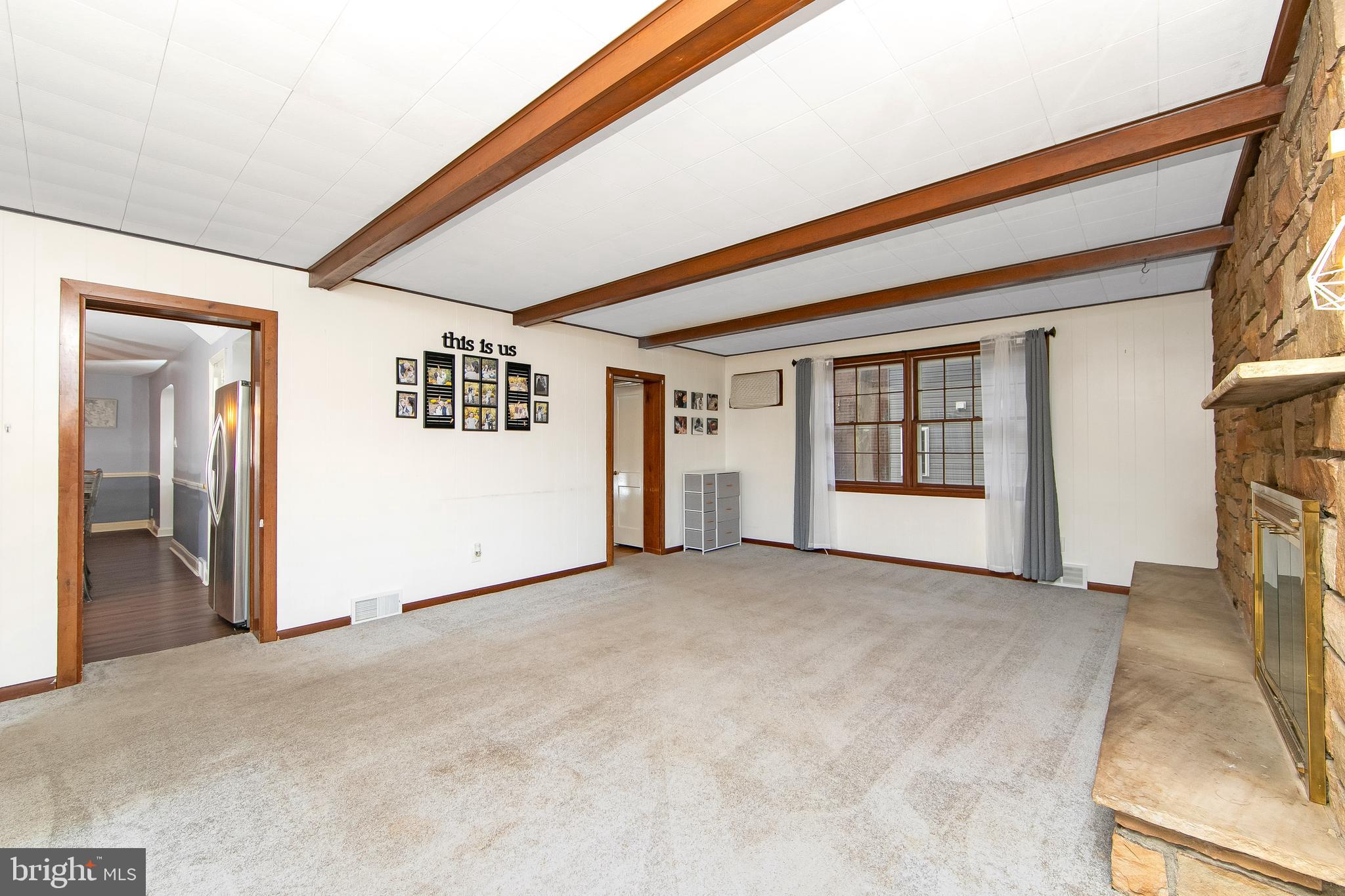 414 Stanfield Road Springfield, PA 19064 - Photo 24 of 51 a view of an empty room with a fireplace