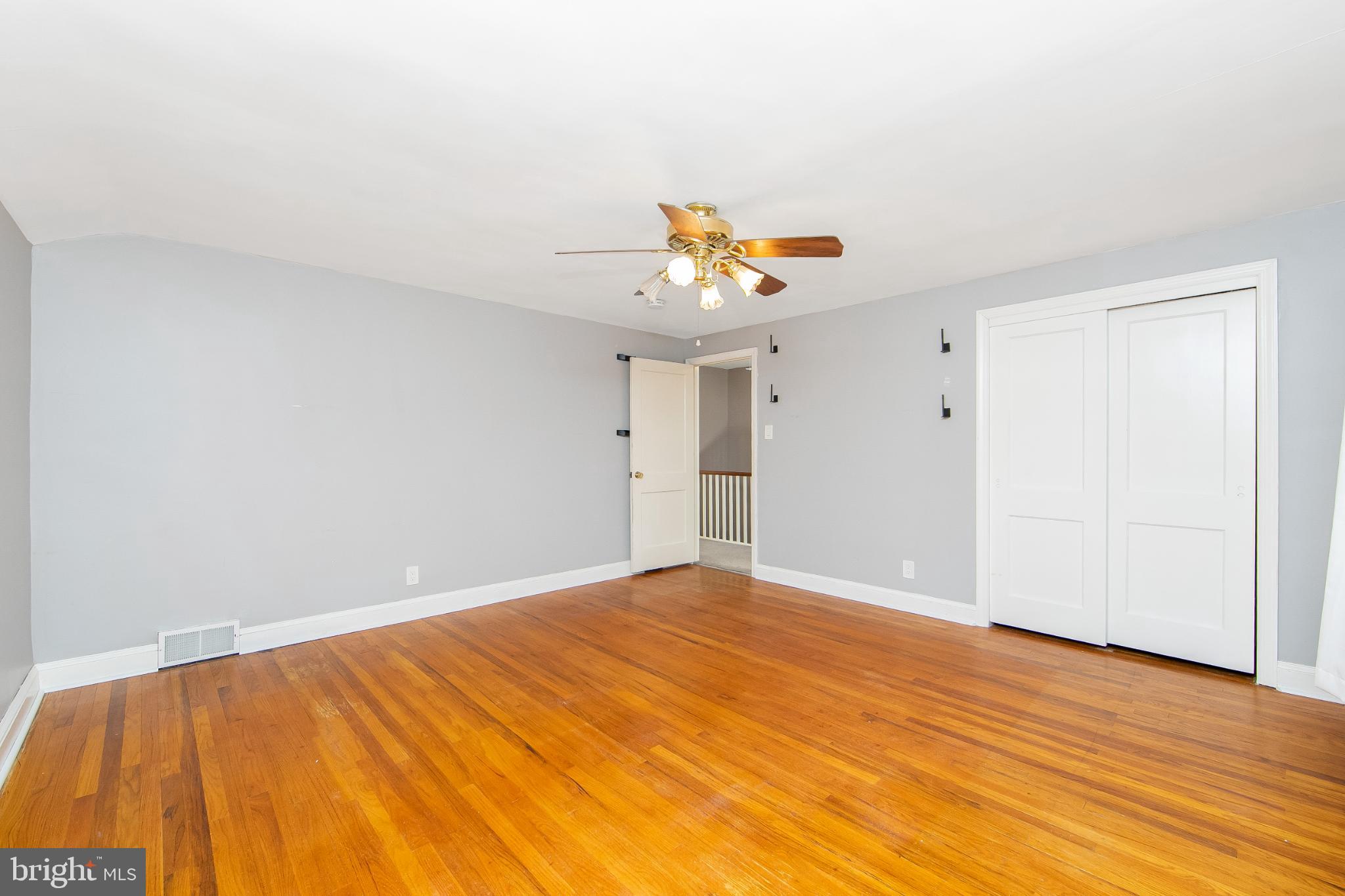 414 Stanfield Road Springfield, PA 19064 - Photo 29 of 51 a view of an empty room with wooden floor