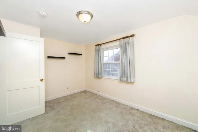 a view of a livingroom with wooden floor