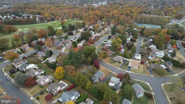 an aerial view of a house with balcony