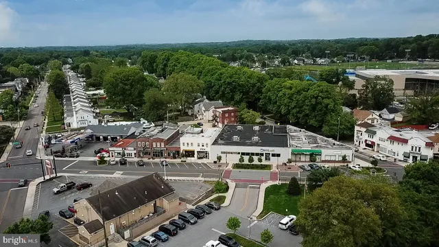 an aerial view of a house with a garden