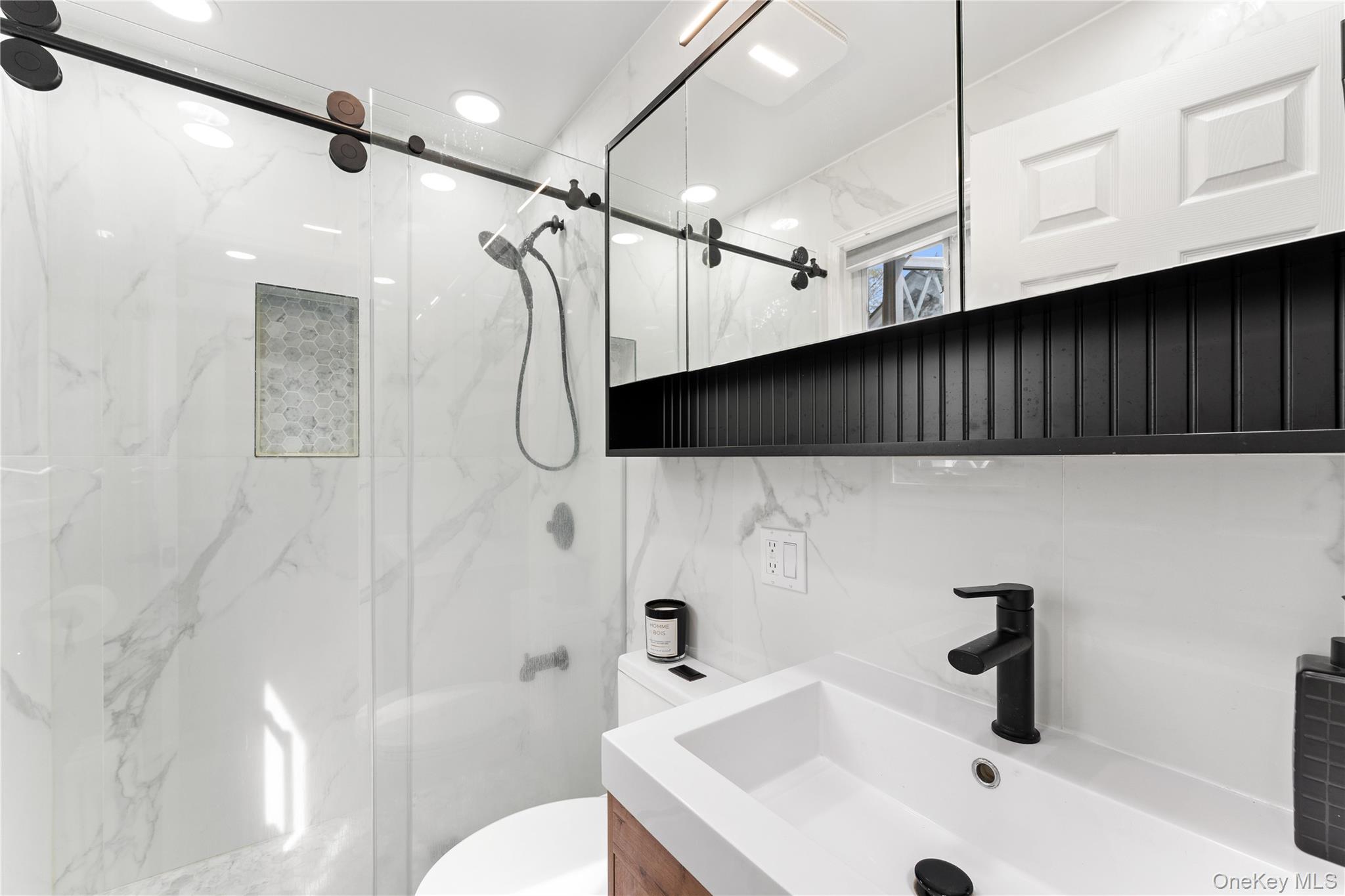 5 Jefferson Road Scarsdale, NY 10583 - Photo 11 of 23 Newly renovated main floor bathroom.