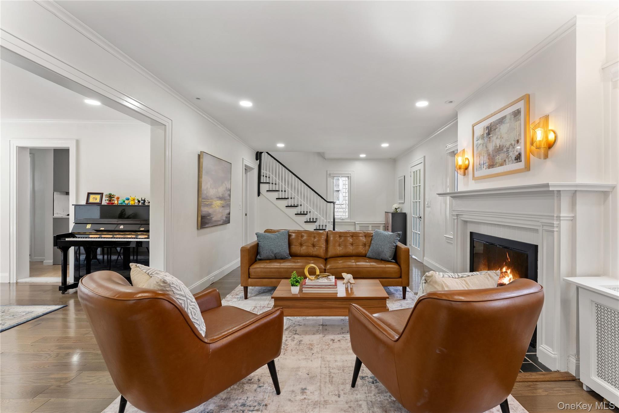 5 Jefferson Road Scarsdale, NY 10583 - Photo 4 of 23 The living room provides access to the dining room and kitchen for easy living and seamless entertaining.