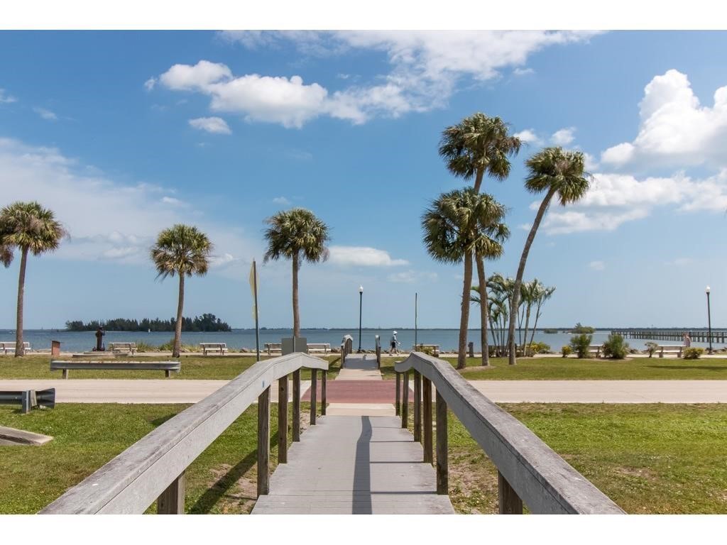 1489 Whitmore Street Sebastian, FL 32958 - Photo 18 of 24 a view of swimming pool with a table and chairs