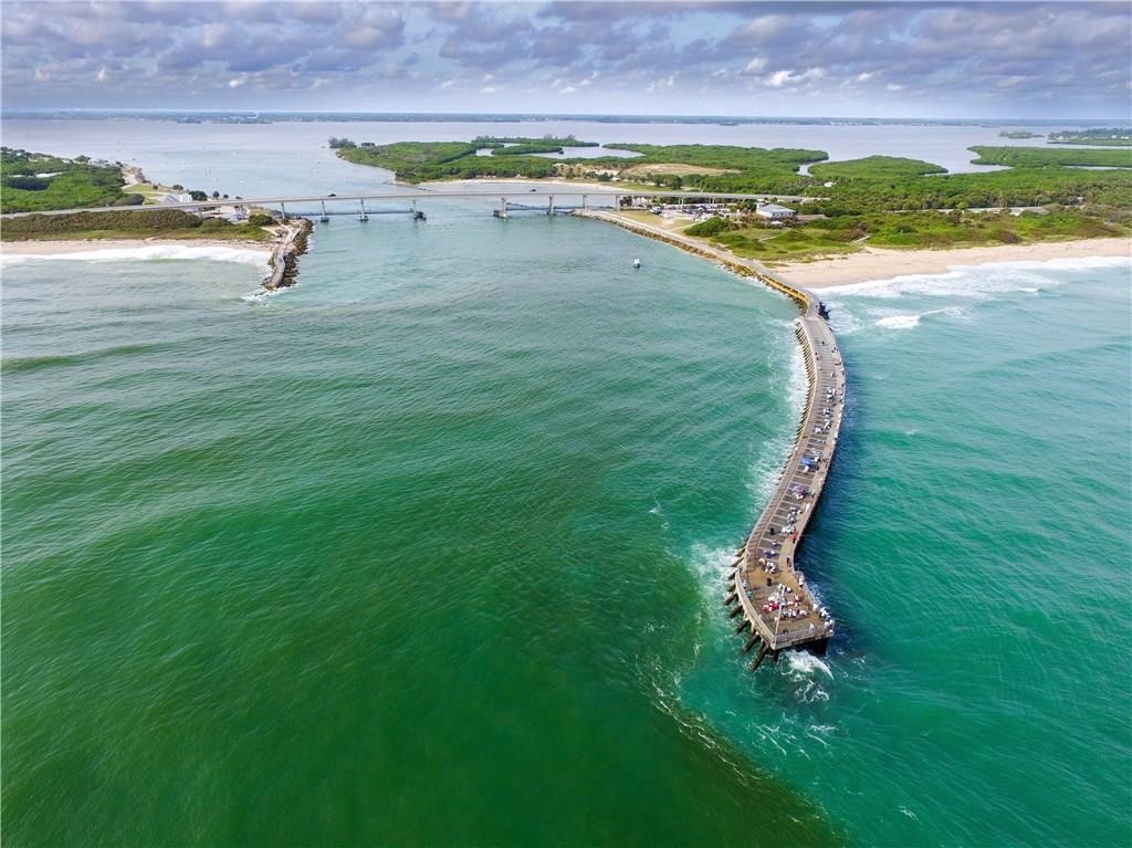 1489 Whitmore Street Sebastian, FL 32958 - Photo 23 of 24 a view of a lake with a yard