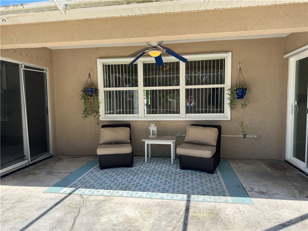 1489 Whitmore Street Sebastian, FL 32958 - Photo 7 of 24 a living room with furniture and a window