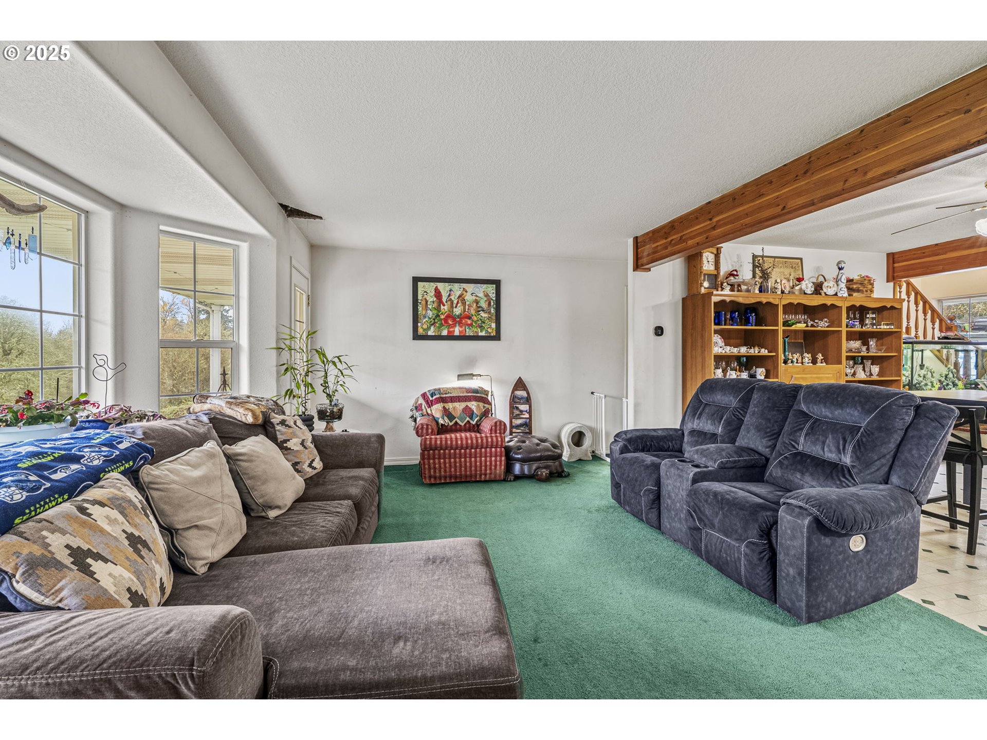 1707 Northwest 354th Street La Center, WA 98629 - Photo 19 of 31 a living room with furniture and a large window