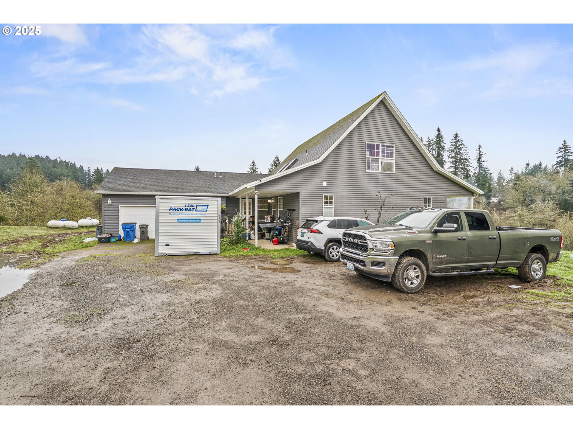 1707 Northwest 354th Street La Center, WA 98629 - Photo 3 of 31 a view of a house with truck parked on the road