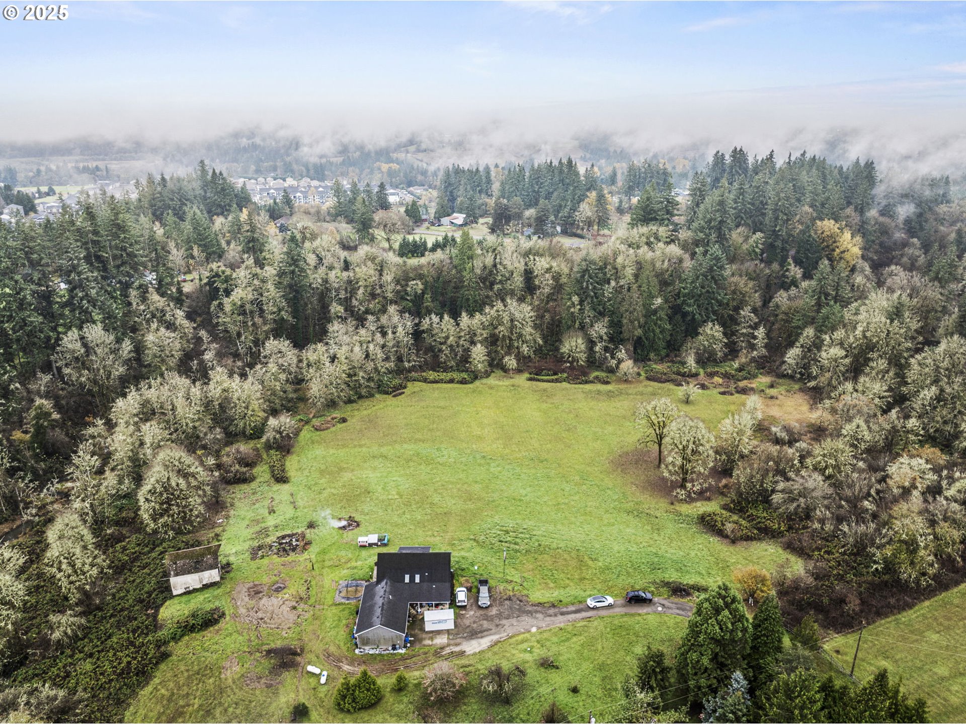1707 Northwest 354th Street La Center, WA 98629 - Photo 7 of 31 an aerial view of residential houses with outdoor space and trees