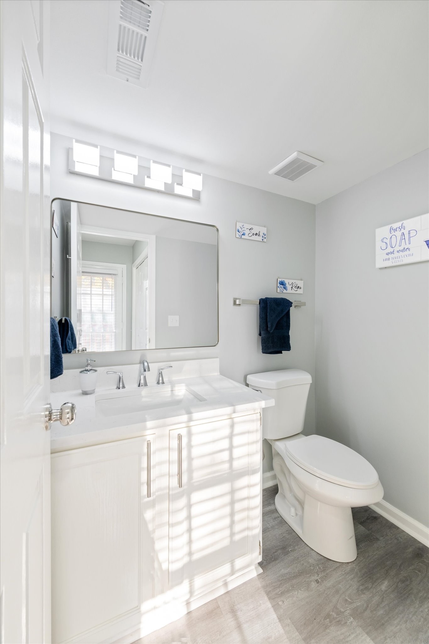 165 Ellington Place Madison, TN 37115 - Photo 12 of 26 a bathroom with a toilet a sink and a mirror