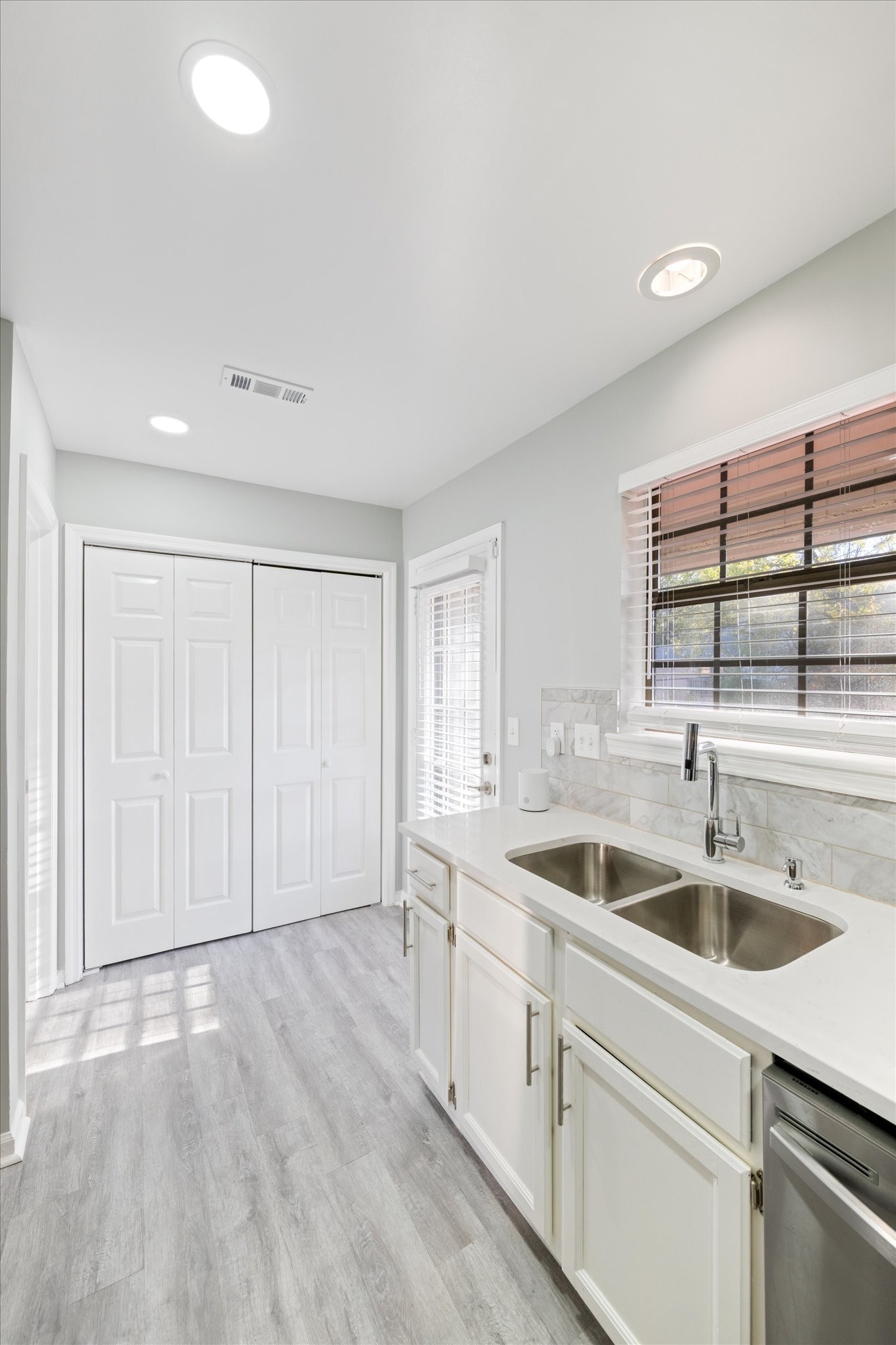165 Ellington Place Madison, TN 37115 - Photo 16 of 26 a kitchen with a sink and cabinets