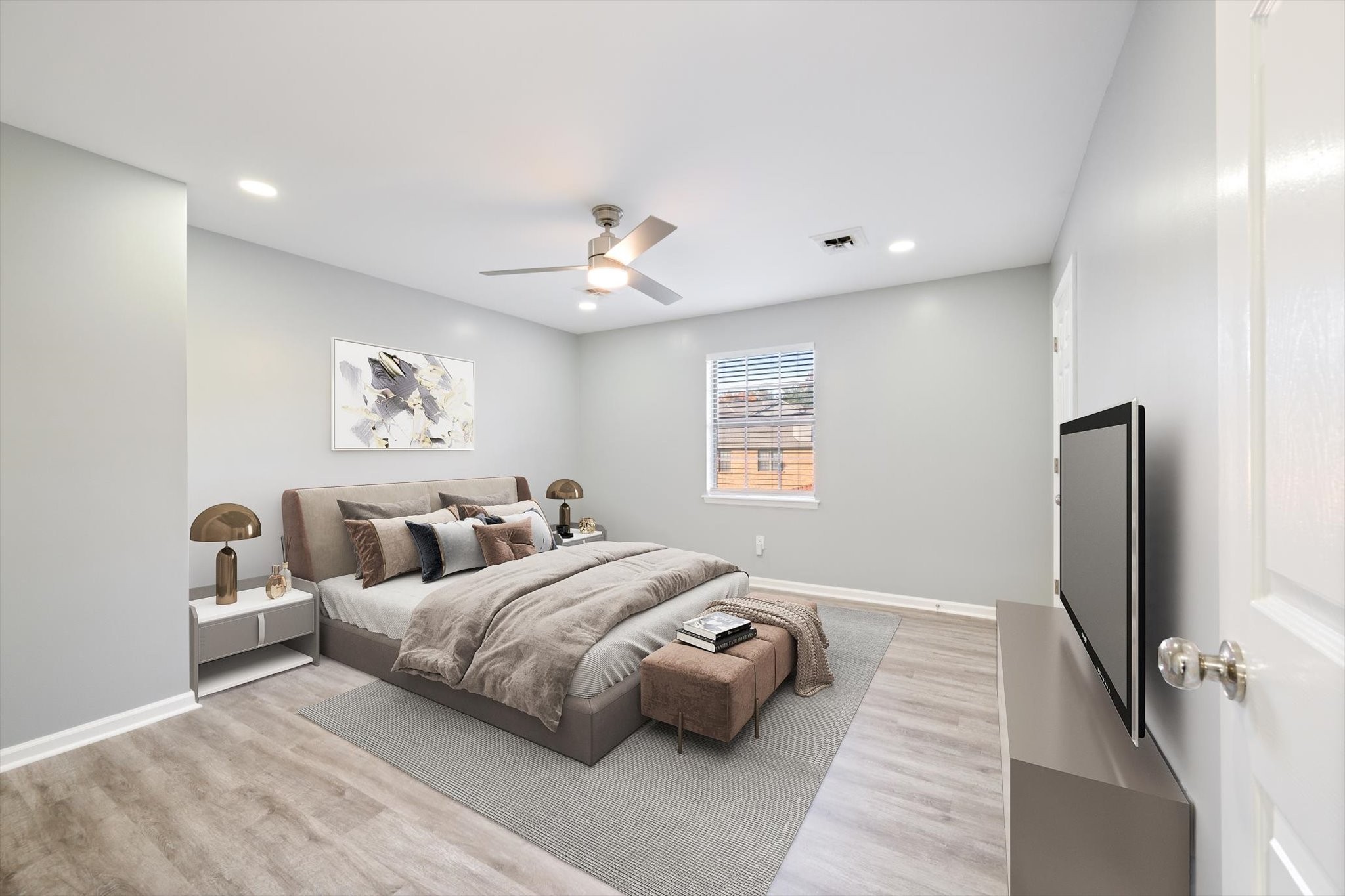165 Ellington Place Madison, TN 37115 - Photo 20 of 26 a spacious bedroom with a bed and a chandelier