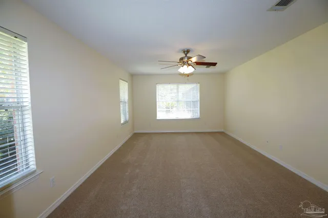 an empty room that has a window