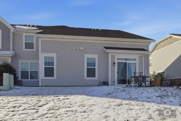 a view of a house with a patio