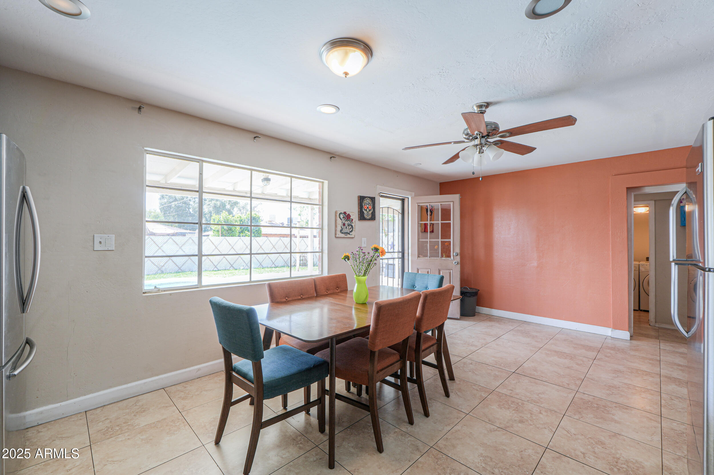 3413 West Ocotillo Road Phoenix, AZ 85017 - Photo 13 of 29 a view of a dining room with furniture and chandelier