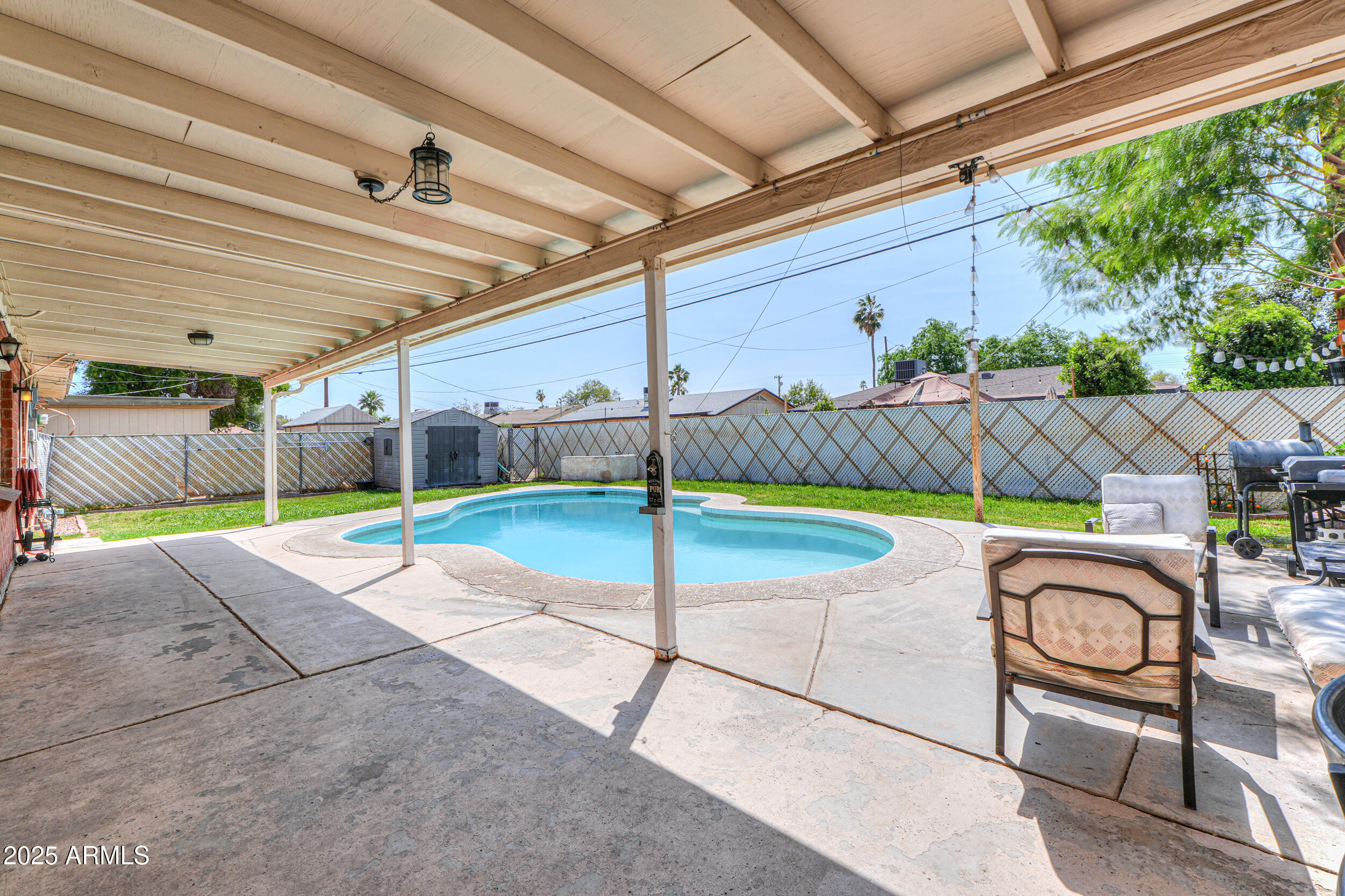 3413 West Ocotillo Road Phoenix, AZ 85017 - Photo 25 of 29 a view of a garden with a chair and swing