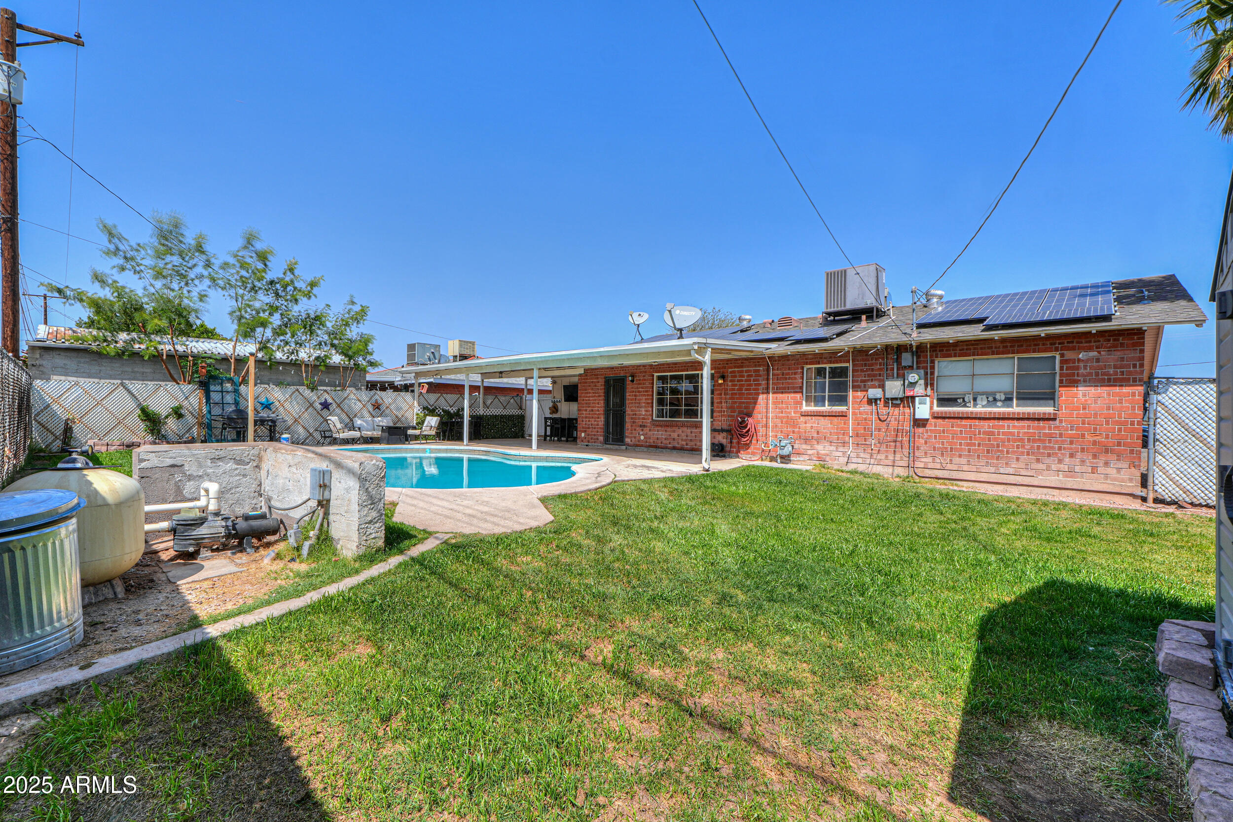 3413 West Ocotillo Road Phoenix, AZ 85017 - Photo 28 of 29 a view of a house with a yard patio and a patio