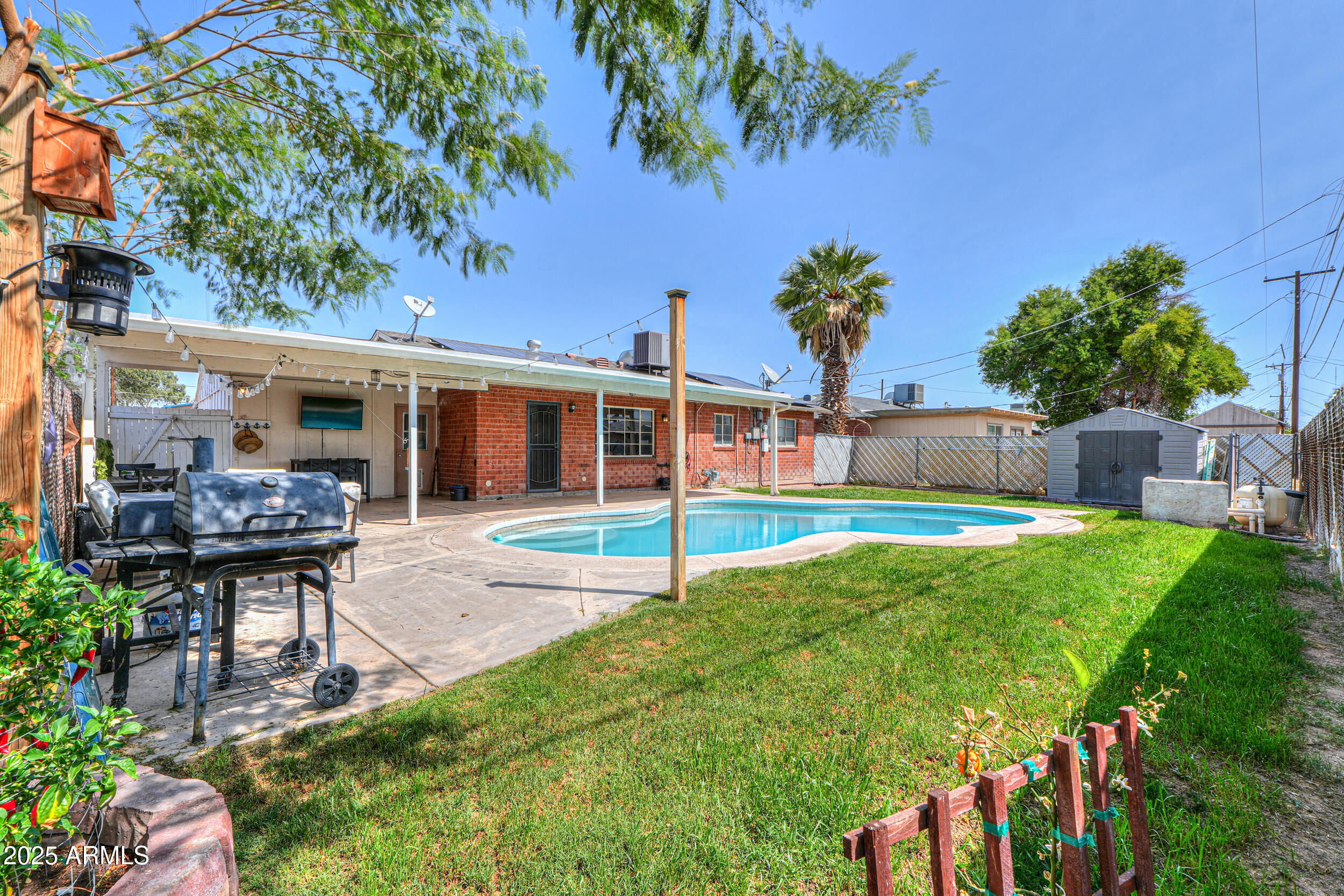3413 West Ocotillo Road Phoenix, AZ 85017 - Photo 29 of 29 a view of a house with backyard and sitting area