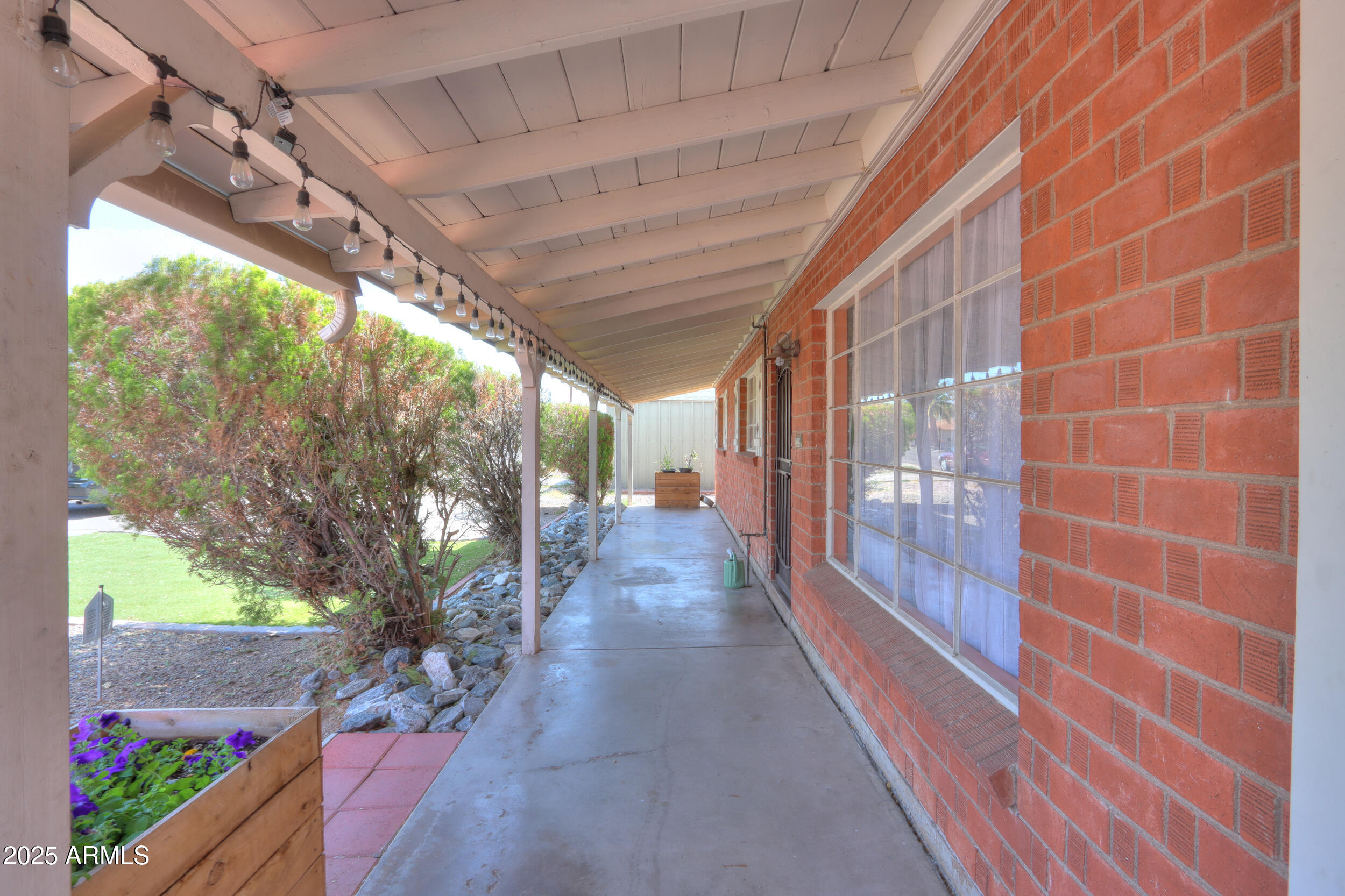 3413 West Ocotillo Road Phoenix, AZ 85017 - Photo 3 of 29 a view of a porch with a patio