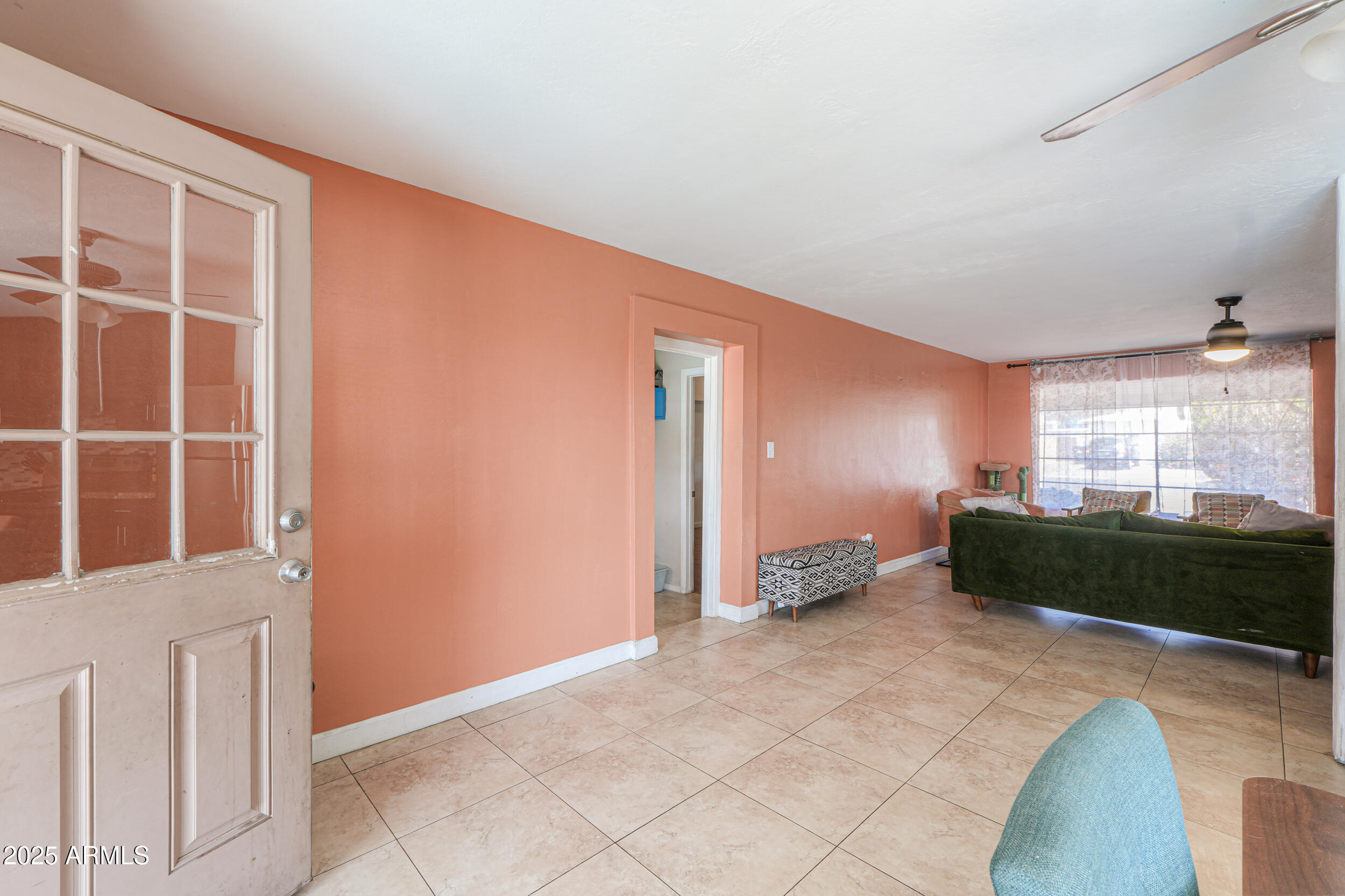 3413 West Ocotillo Road Phoenix, AZ 85017 - Photo 9 of 29 a bedroom with a bed and a window
