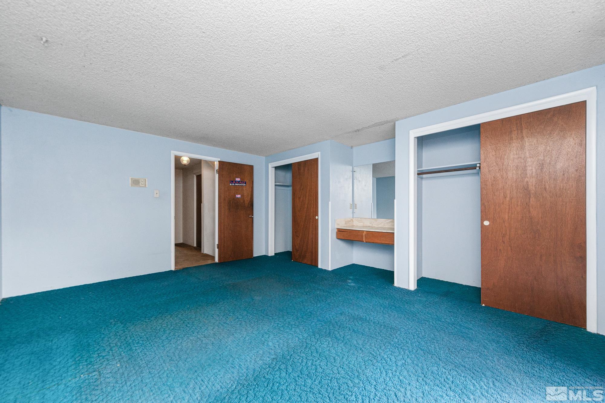 2300 Balsam Street Reno, NV 89509 - Photo 20 of 40 a view of an empty room with closet and a window