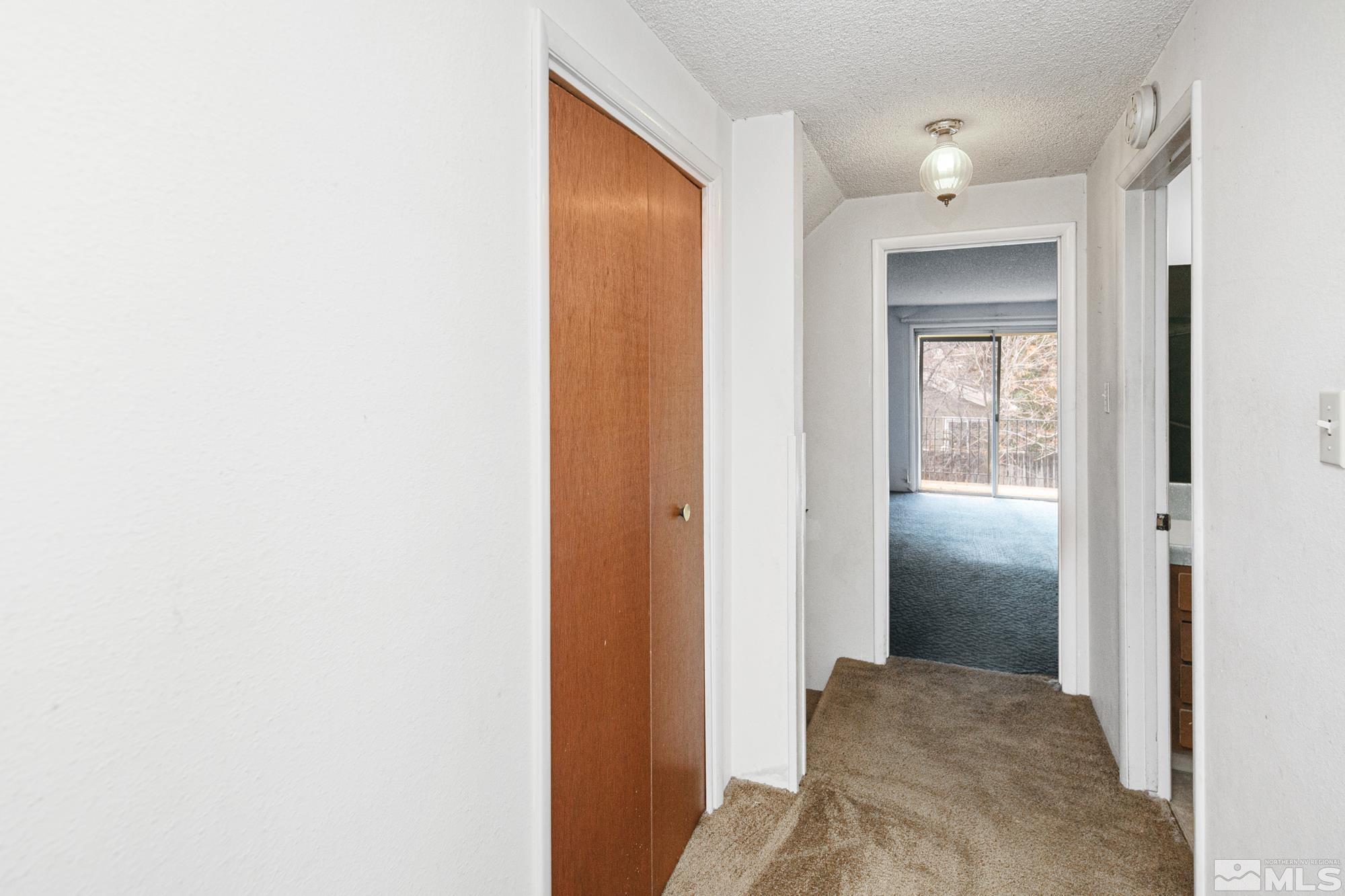2300 Balsam Street Reno, NV 89509 - Photo 26 of 40 a view of hallway with wooden floor