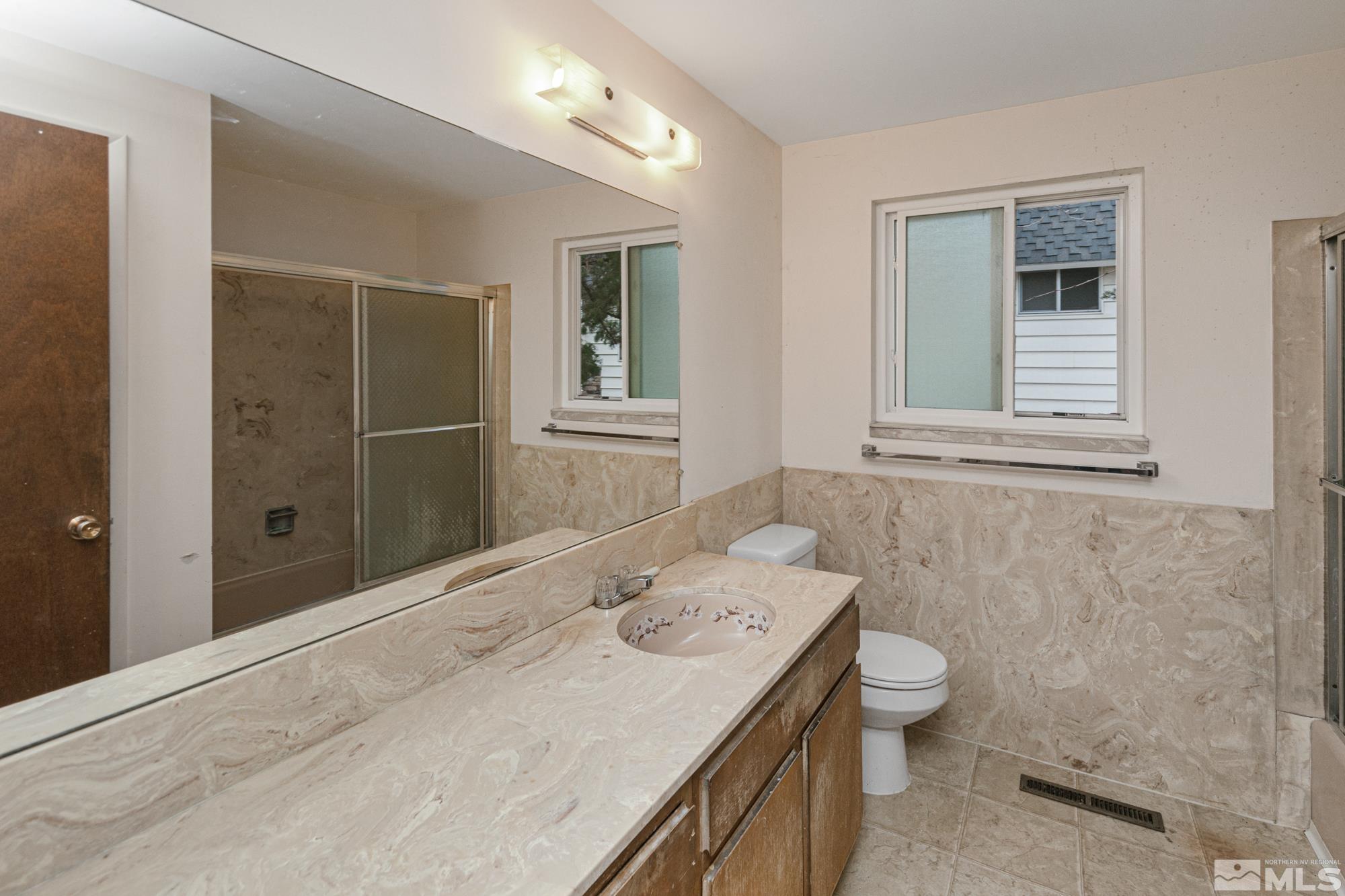 2300 Balsam Street Reno, NV 89509 - Photo 30 of 40 a bathroom with a sink toilet and shower