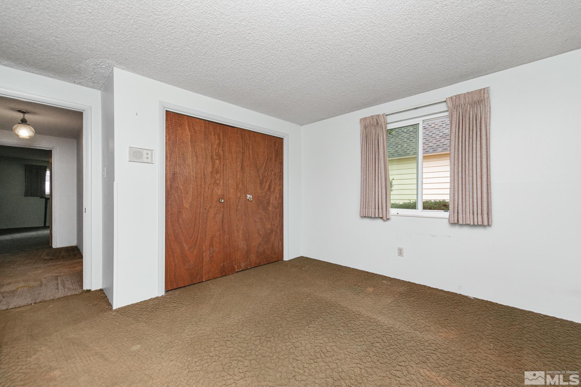 2300 Balsam Street Reno, NV 89509 - Photo 32 of 40 an empty room with windows
