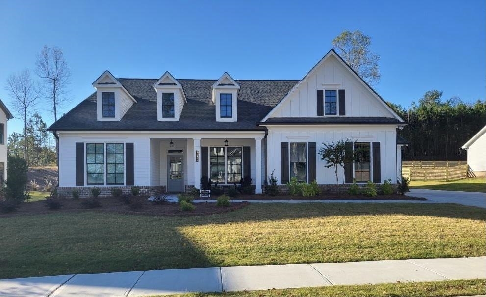 4195 Sewell Road, Unit 3 Cumming, GA 30028 - Photo 1 of 1 a front view of a house with swimming pool