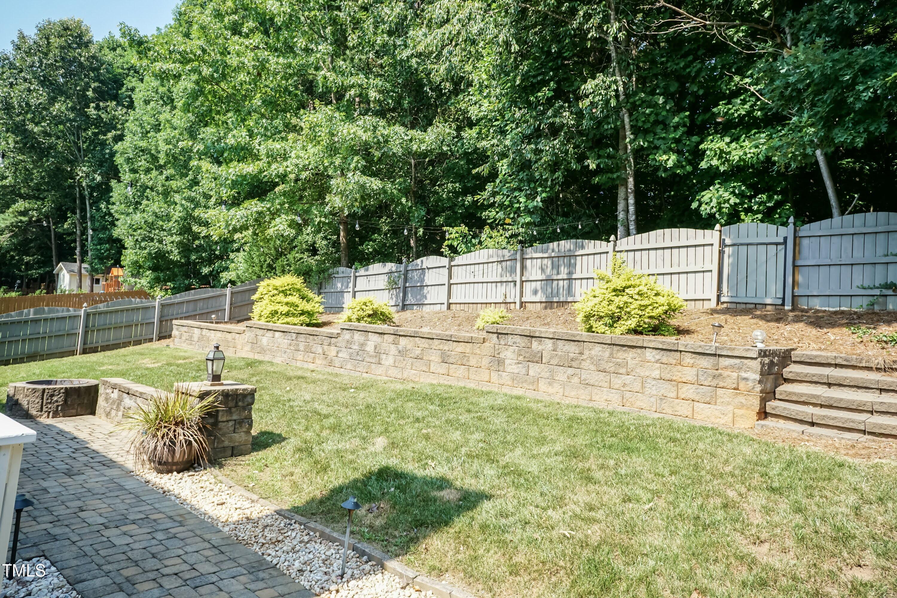 212 Mickleson Ridge Drive Raleigh, NC 27603 - Photo 39 of 58 Back Yard 01