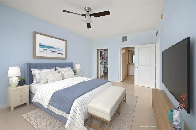 a view of a hallway with bathroom and a livingroom view