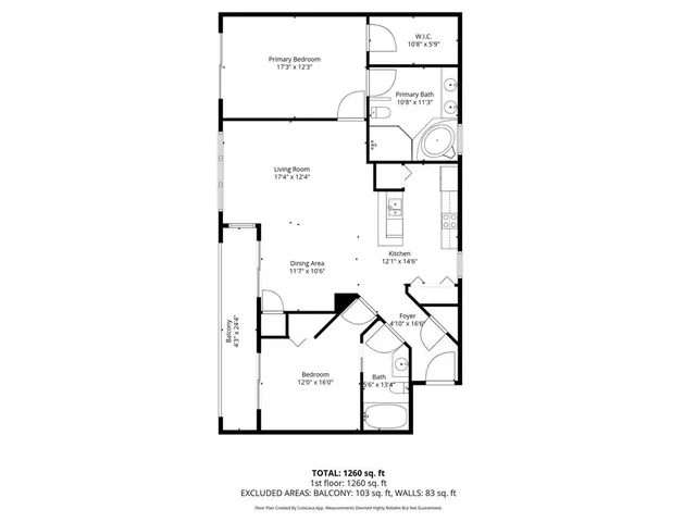 a view of a lake with a building in the background