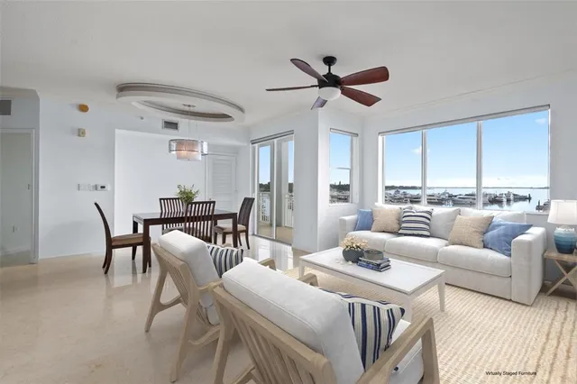 a kitchen with stainless steel appliances granite countertop a stove microwave and refrigerator