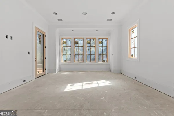 an empty room with windows