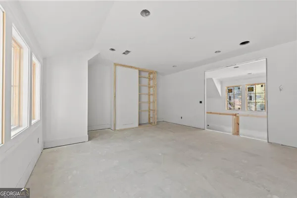 an empty room with a natural light