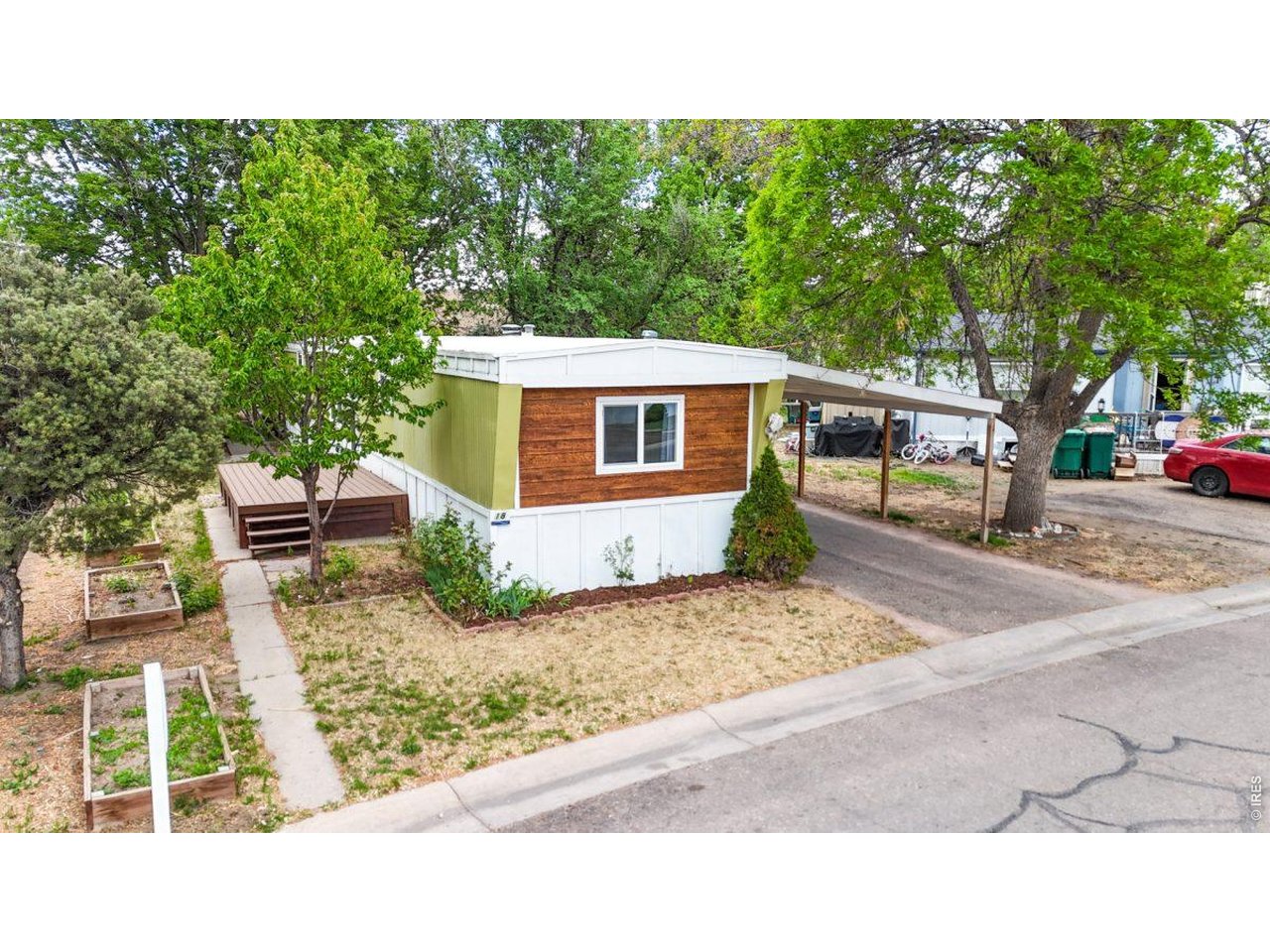 2500 East Harmony Road, Unit 18 Fort Collins, CO 80528 - Photo 25 of 41 a view of a house with a backyard