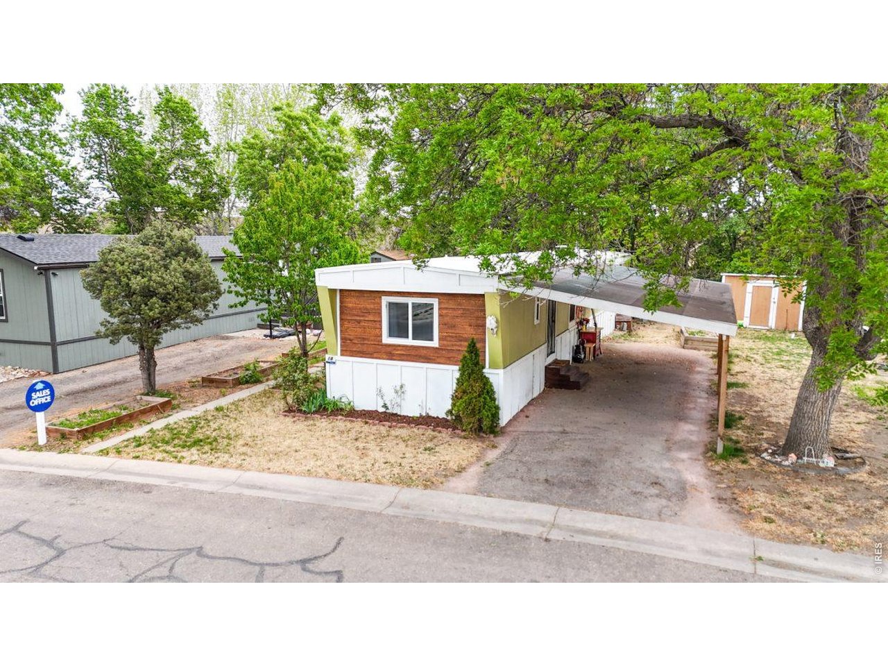 2500 East Harmony Road, Unit 18 Fort Collins, CO 80528 - Photo 26 of 41 a view of a backyard with a sitting area